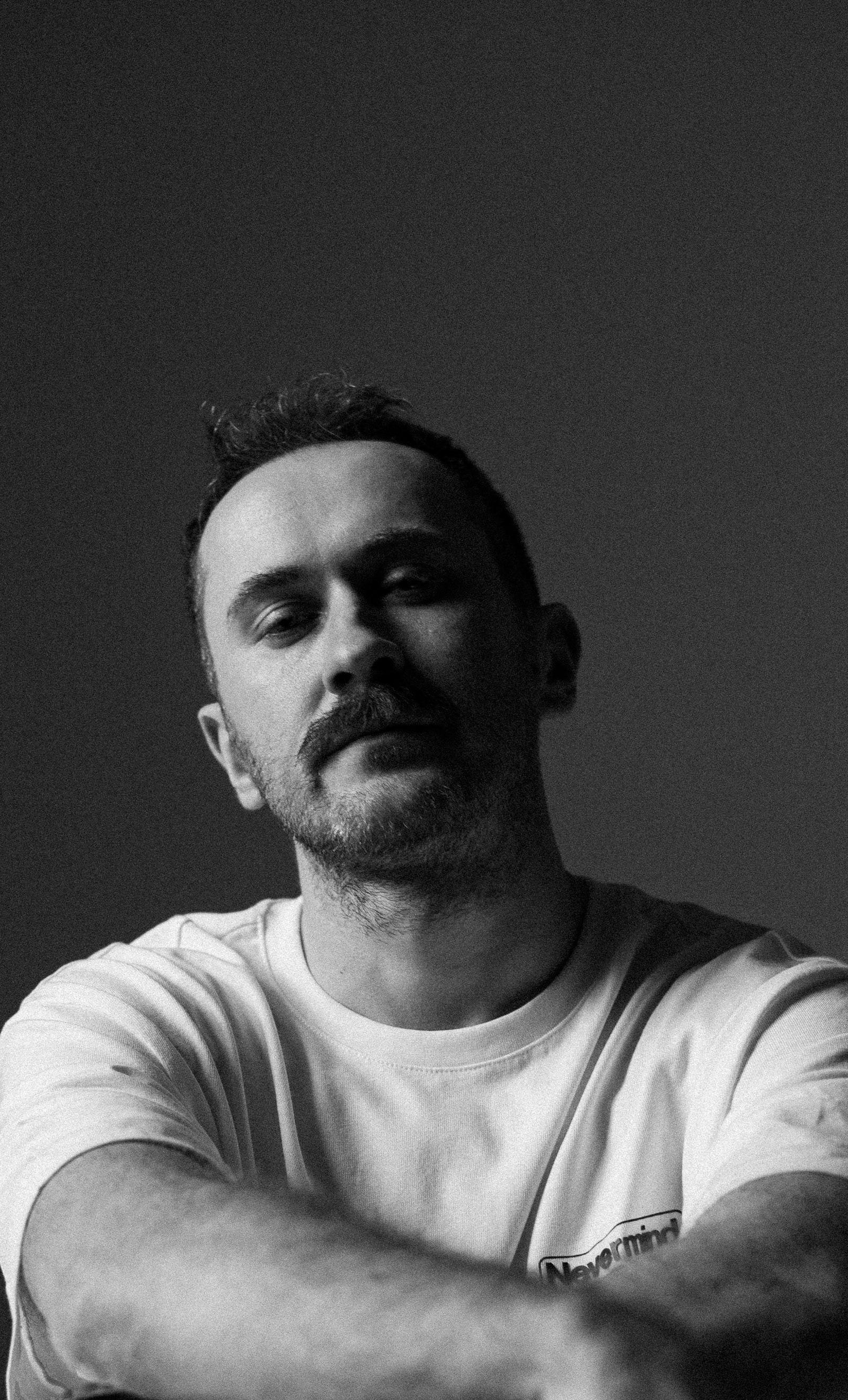 Black-and-white portrait of Alexey Gubin.